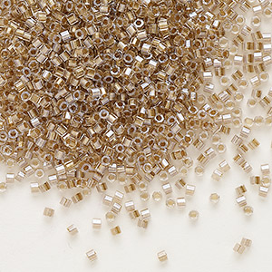 Seed bead, Delica&reg;, glass, translucent beige-lined luster crystal clear, (DBC0907), #11 cut. Sold per 7.5-gram pkg.