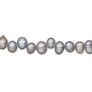 Pearl, cultured freshwater (dyed), silver peacock, 6x5mm-7x6mm top-drilled rice, B- grade, Mohs hardness 2-1/2 to 4. Sold per 16-inch strand.