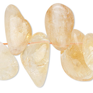 Bead, citrine (heated), extra-large top-drilled Hawaiian chip, Mohs hardness 7. Sold per 15-1/2&quot; to 16&quot; strand.