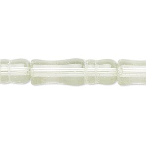 Bead, glass, pale green, 25x6mm-26x8mm textured round tube. Sold per 15-inch strand.