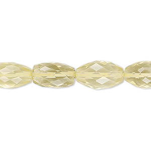 Bead, lemon quartz (heated), 13x8mm-16x10mm hand-cut faceted oval and faceted puffed oval, B+ grade, Mohs hardness 7. Sold per 8-inch strand.