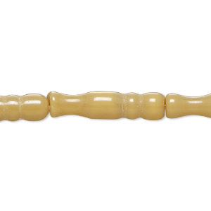 Bead, cat&#39;s eye glass (fiber optic glass), tan, 25x5mm-27x7mm bamboo. Sold per 15-inch strand, approximately 15 beads.