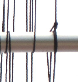 Tie End of Thread to Warp Bar with Square Knot