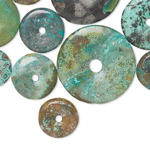 Focal mix, turquoise (dyed / stabilized), 10-54mm donut, D grade, Mohs hardness 5 to 6. Sold per 1/4 pound pkg.