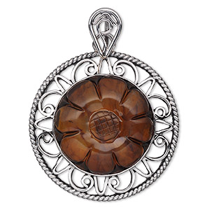 Pendant, amber (heated) and antiqued sterling silver, 38mm filigree round with 25mm carved flower. Sold individually.