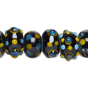 Bead, lampworked glass, black / yellow / blue, 14x10mm rondelle. Sold per pkg of 20.