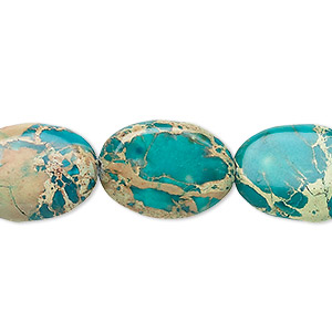 Bead, magnesite (dyed / stabilized), turquoise blue, 18x13mm flat oval, B grade, Mohs hardness 3-1/2 to 4. Sold per 15-1/2&quot; to 16&quot; strand.