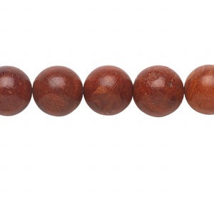 Bead, sponge coral (dyed / coated), red, 12-13mm round, C- grade, Mohs hardness 3-1/2 to 4. Sold per 15&quot; to 16&quot; strand.
