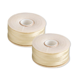 Thread, Nymo&reg;, nylon, light tan, size B. Sold per pkg of (2) 72-yard bobbins.