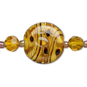 Bead, glass and lampworked glass, topaz yellow and black, 7mm faceted round / 9mm round / 21mm flat round with copper-colored glitter. Sold per 7-inch strand, approximately 25 beads.