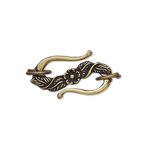 Clasp, S-hook, antique brass-plated pewter (tin-based alloy), 24x14mm with floral design and (2) 8.5mm jump rings. Sold per pkg of 2.