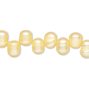Pearl, cultured freshwater (dyed), jonquil, 9x7mm-10x7mm top-drilled rice, D grade, Mohs hardness 2-1/2 to 4. Sold per 16-inch strand.