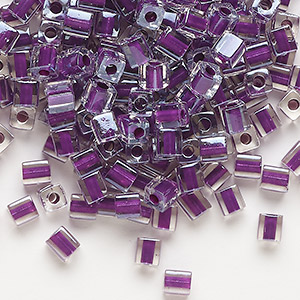 Seed bead, Miyuki, glass, clear color-lined purple, (SB243), 3.5-3.7mm square. Sold per 25-gram pkg.