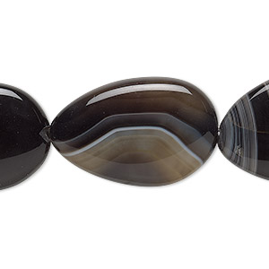 Bead, black agate (dyed), 26x17mm-32x23mm freeform, B grade, Mohs hardness 6-1/2 to 7. Sold per 8-inch strand, approximately 5 beads.