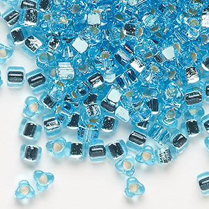 Seed bead, Miyuki, glass, silver-lined translucent light blue, (TR1803), #5 triangle. Sold per 25-gram pkg.