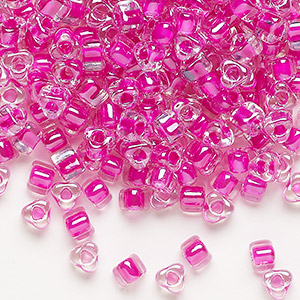 Seed bead, Miyuki, glass, transparent clear color-lined fuchsia, (TR1110), #5 triangle. Sold per 25-gram pkg.