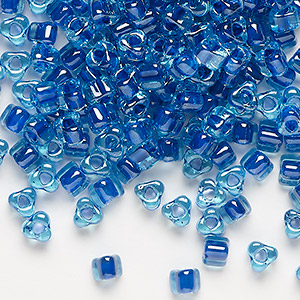 Seed bead, Miyuki, glass, transparent light blue color-lined dark blue, (TR1828), #5 triangle. Sold per 25-gram pkg.