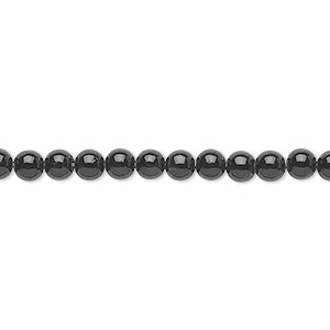 Bead, riverstone (dyed), black, 4mm round, B grade, Mohs hardness 3-1/2. Sold per 15-1/2&quot; to 16&quot; strand.