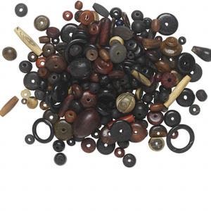 Bead mix, bone and horn (dyed), red / black / brown, 8mm-51x37mm mixed shape. Sold per 1/4 kilogram pkg, approximately 225 to 375 beads.