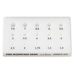 Draw plate, Delrin&reg; plastic, white and black, 4 x 2-1/2 x 1/2 inch rectangle with 15 graduated holes. Sold individually.