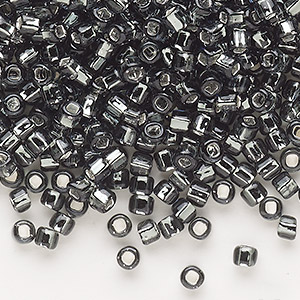 Seed bead, Dyna-Mites&#153;, glass, silver-lined translucent gunmetal, #6 round with square hole. Sold per 40-gram pkg.
