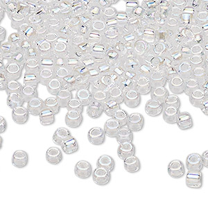Seed bead, Miyuki, glass, transparent iris clear, (TR1151), #5 triangle.  Sold per 25-gram pkg. - Fire Mountain Gems and Beads