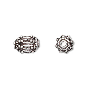 Bead, antiqued sterling silver, 14x9mm ribbed oval with 2.7-2.8mm hole. Sold per pkg of 2.