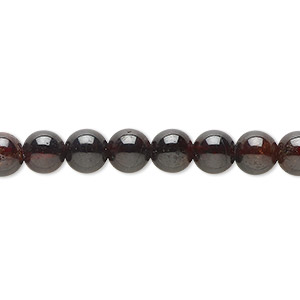 Bead, garnet (dyed / oiled), 7-9mm round, C- grade, Mohs hardness 7 to 7-1/2. Sold per 15-inch strand.