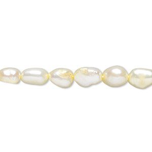 Pearl, cultured freshwater (dyed), daffodil, 6-7mm flat-sided rice, C- grade, Mohs hardness 2-1/2 to 4. Sold per 16-inch strand.