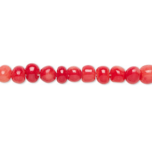 Bead, coral (dyed), red, small hand-cut pebble, Mohs hardness 3-1/2 to 4. Sold per 15-1/2&quot; to 16&quot; strand.