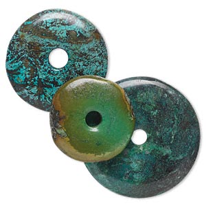 Focal, turquoise (dyed / stabilized), 35-60mm round donut, C grade, Mohs hardness 5 to 6. Sold per pkg of 3.