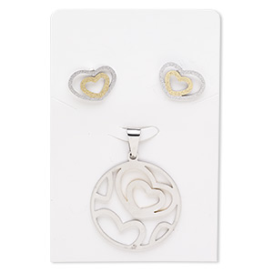 Pendant and earring, stainless steel and gold-finished stainless steel, 33mm stardust round with heart cutout design, 17x12mm stardust heart with post. Sold per set.