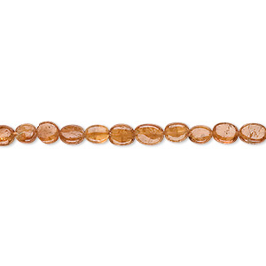 Bead, hessonite garnet (natural), 4x3mm-6x4mm flat oval, C grade, Mohs hardness 7 to 7-1/2. Sold per 14-inch strand.