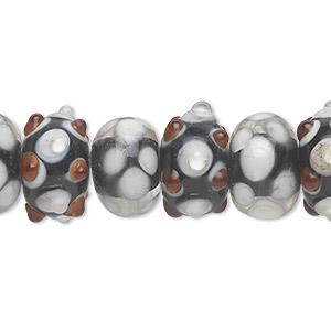 Bead, lampworked glass, black / white / red, 14x8mm-16x10mm bumpy rondelle with assorted designs. Sold per pkg of 20.