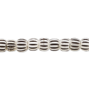 Bead, bone (dyed), white and black, 6.5x5.5mm corrugated barrel. Sold per 15-1/2&quot; to 16&quot; strand.
