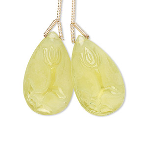 Bead, lemon quartz (heated), frosted, 25x15mm hand-cut top-drilled carved teardrop with double-sided flower design, B+ grade, Mohs hardness 7. Sold per pkg of 2 beads.