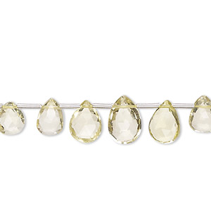 Bead, lemon quartz (heated), 6x4mm-10x7mm graduated hand-cut top-drilled faceted puffed teardrop, B grade, Mohs hardness 7. Sold per 4-inch strand, approximately 10 beads.