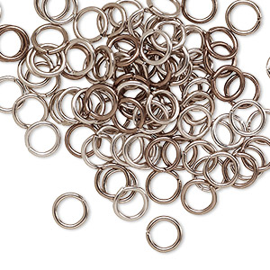 Jump ring, anodized aluminum, bronze, 6mm round, 4.2mm inside diameter, 18 gauge. Sold per pkg of 100.