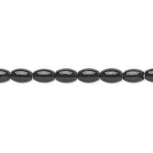 Bead, riverstone (dyed), black, 6x4mm oval, B grade, Mohs hardness 3-1/2. Sold per 15-1/2&quot; to 16&quot; strand.