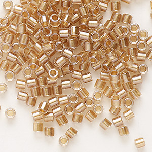 Seed bead, Delica&reg;, glass, translucent honey beige-lined luster crystal clear, (DBL0901), #8 round. Sold per 50-gram pkg.
