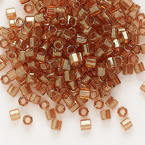 Seed bead, Delica&reg;, glass, translucent gold luster apricot topaz, (DBLC0121), #8 cut. Sold per 50-gram pkg.