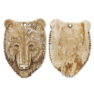 Focal, antiqued bone (dyed), 45x32mm hand-carved single-sided domed bear face, Mohs hardness 2-1/2. Sold individually.