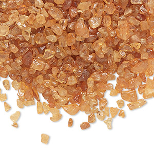 Inlay chip, spessartite garnet (natural), mini undrilled chip, Mohs hardness 7 to 7-1/2. Mini chips range in size from approximately 1mm to 9mm. Sold per 1-ounce pkg.