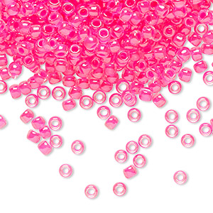 Seed bead, TOHO BEADS&reg;, glass, translucent luminous neon pink, (TR-08-978), #8 round. Sold per 7.5-gram pkg.