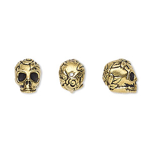 Bead, TierraCast&reg;, antique gold-plated pewter (tin-based alloy), 10x8mm 3D skull with rose and leaf design. Sold per pkg of 2.