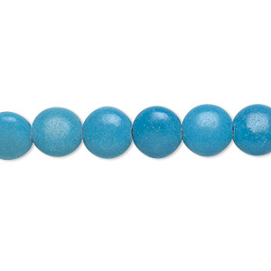 Bead, magnesite (dyed / stabilized), dark blue, 8mm puffed flat round, C grade, Mohs hardness 3-1/2 to 4. Sold per 15-inch strand.