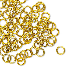 Jump ring, anodized tempered aluminum, gold, 6mm round, 4.2mm inside diameter, 18 gauge. Sold per pkg of 100.