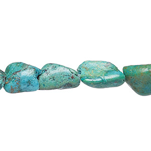 Bead, turquoise (dyed / stabilized), blue, small flat nugget, Mohs hardness 5 to 6. Sold per 7-inch strand.