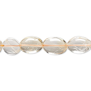 Bead, quartz crystal and citrine (natural / heated), 9x8mm-13x9mm hand-cut puffed oval, C grade, Mohs hardness 7. Sold per 14-inch strand.