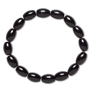 Bracelet, stretch, glass, opaque black, 9x7mm-11x8mm barrel, 6-1/2 inches. Sold individually.